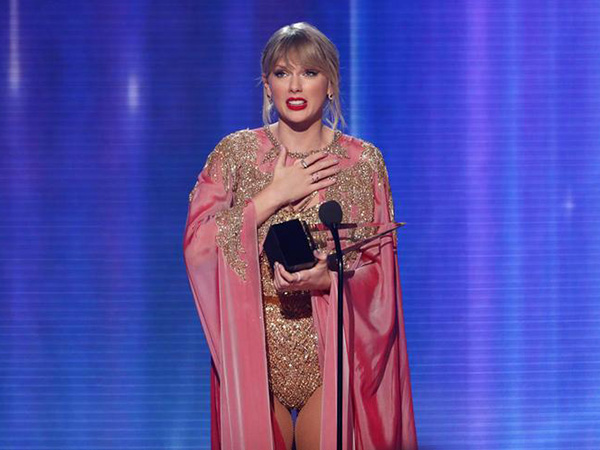Taylor Swift releases Christmas song and video 'made from home videos'