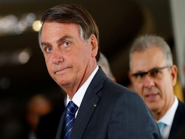 Brazilian president in isolation after contact with COVID-19-positive aide