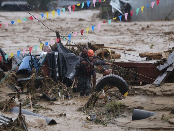 Death toll in Australia floods rises to four, tens of thousands stranded