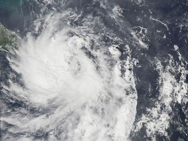 More than 10 million people under storm warnings as Tropical Storm Beta crawls toward shore