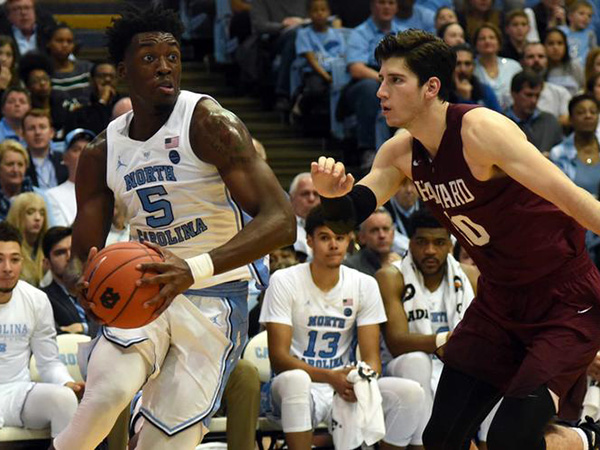 Harvard Crimson basketball team sprinkled with red and white