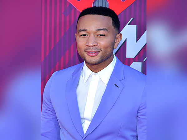 John Legend pays tribute to 'humbling' Chrissy Teigen following baby loss