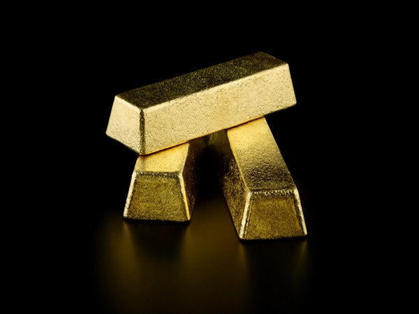 Gold rises on weaker U.S. dollar