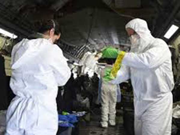 Coronavirus can float in air, and experts say WHO and CDC should tell people that