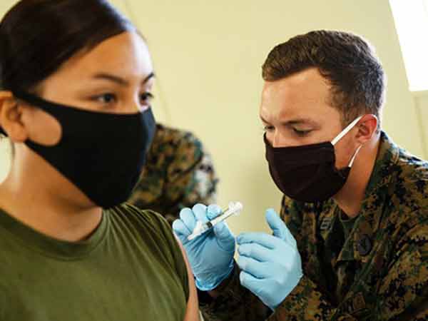 Masks are critical to stopping coronavirus spread, even at home, CDC says