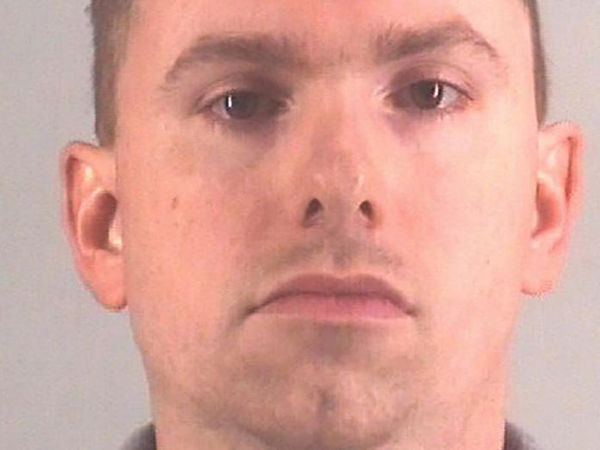 Fort Worth police officer jailed on murder charge after resigning in shooting that killed woman in home