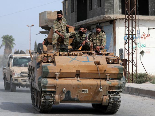 Turkish-led Syrian rebel fighters advancing on flashpoint region of Manbij