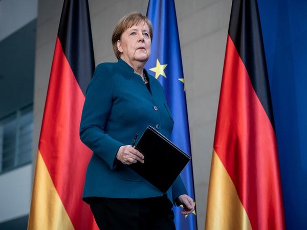 Outgoing German Chancellor Merkel honored with military ceremony