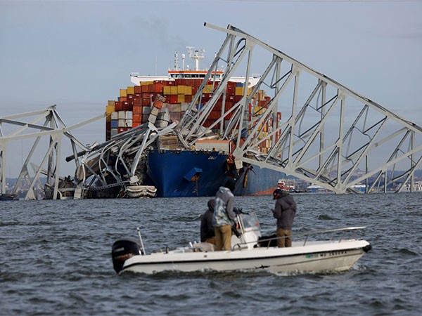 Divers recover two bodies from river after Baltimore bridge collapse