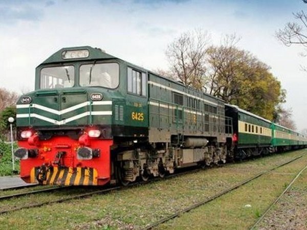 Passenger train rams into parked freight train in Pakistan