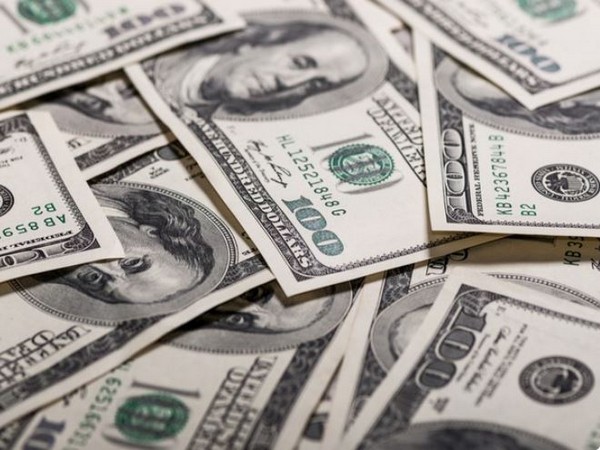 U.S. dollar slips amid economic data
