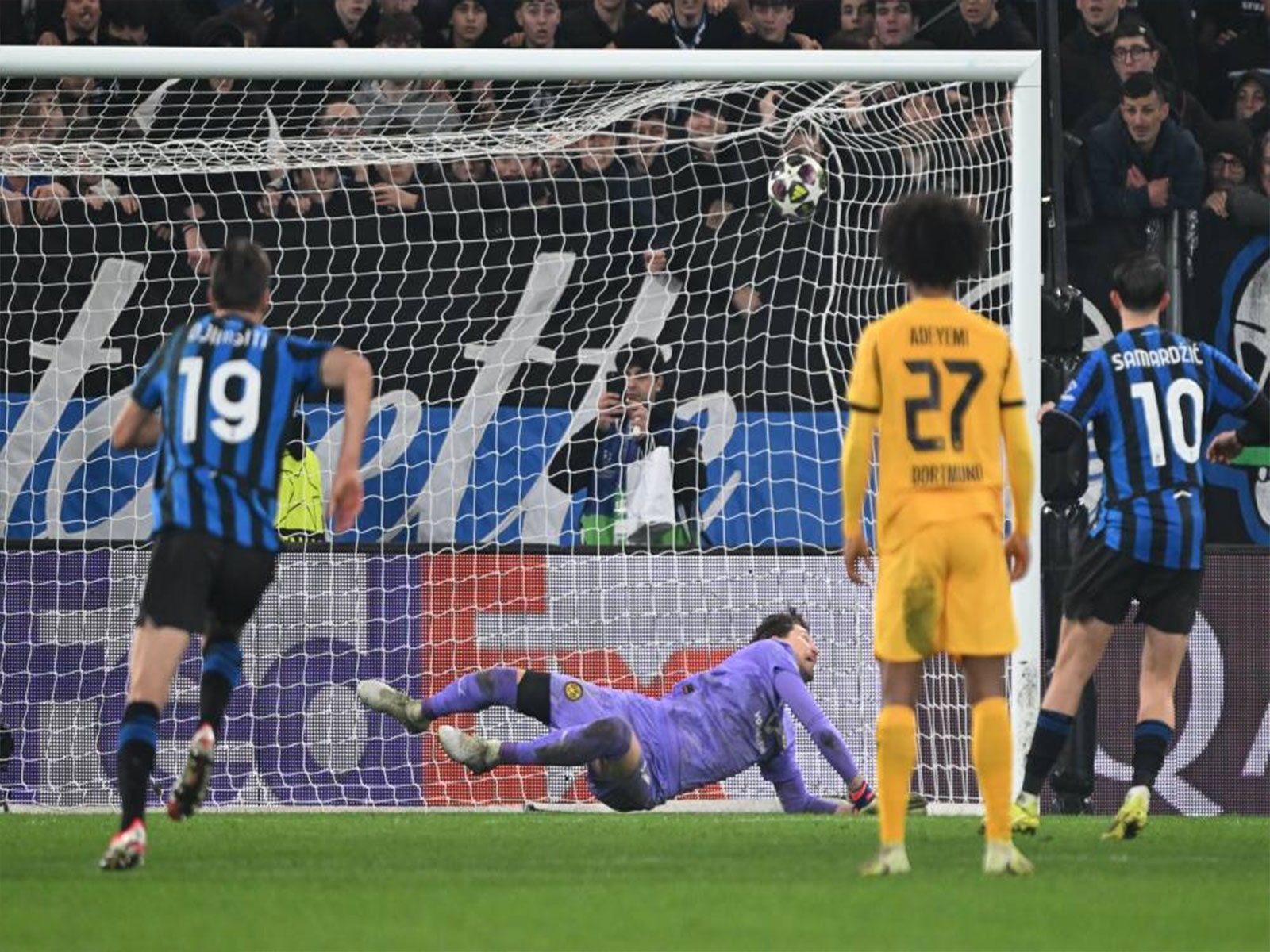 Atalanta eliminate Dortmund with controversial late penalty