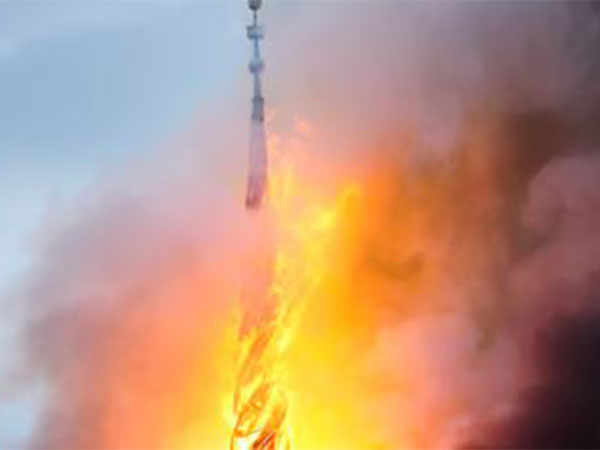 Spire collapses as historic Borsen engulfed in flames