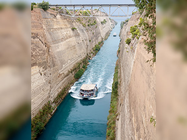 Cruise ship narrowly passes through Greek canal in historic first