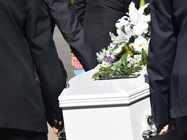 Prankster's pre-recorded funeral message from the grave gives family one last laugh