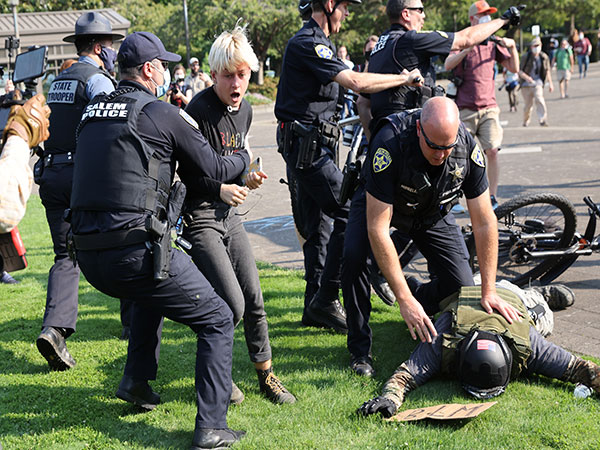 Portland protester charged with pointing 'high-powered laser' into officer's eye