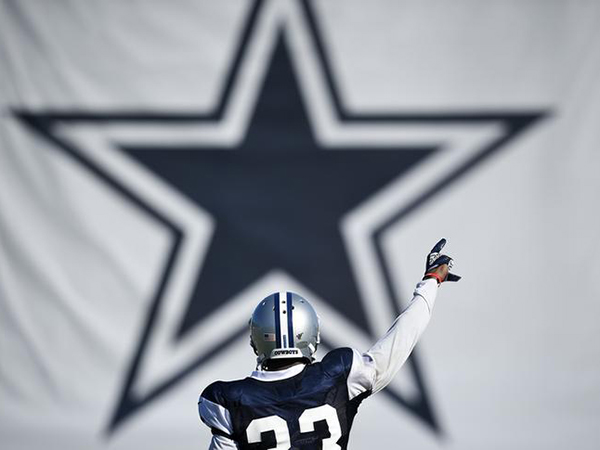 Famed NFL writer pulled over by cops during live radio interview