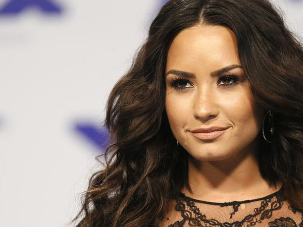 Demi Lovato leaning on faith following near-fatal overdose