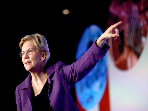 Warren rolls out plan that would ban federal judges from owning or trading individual stocks