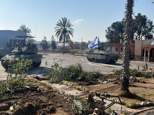 Israel says reopening Gaza border crossing amid intensified attacks