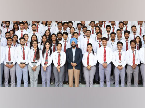 Students of Chandigarh University who have been placed during campus placements along with University Chancellor Satnam Singh Sandhu