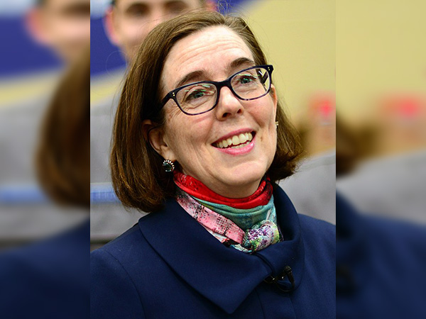 Oregon governor tells residents to call cops on people violating COVID restrictions