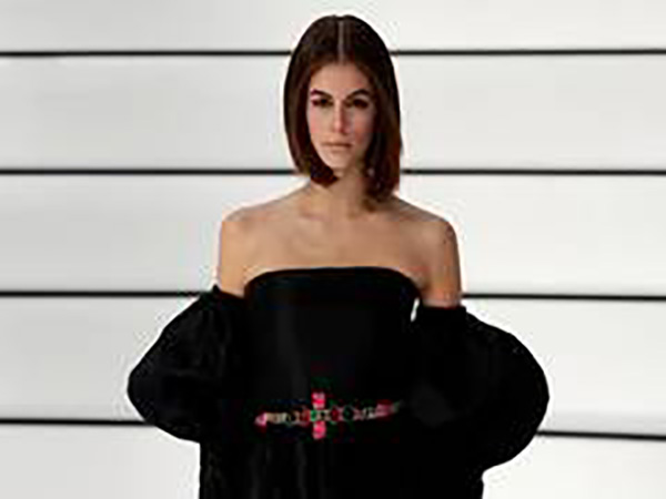 Kaia Gerber reveals broken wrist in bikini pic: 'Had a little accident'