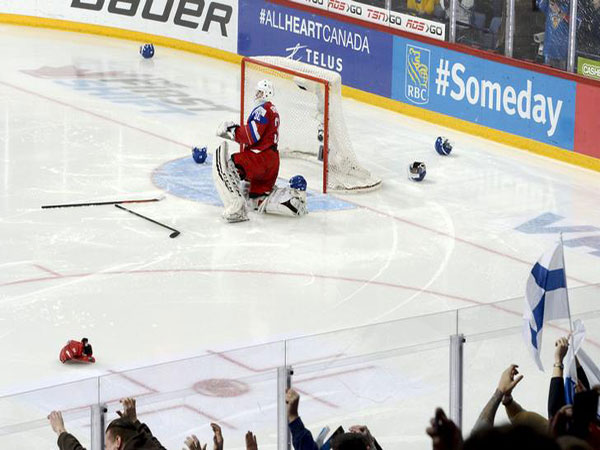Canada routed by Russia, top prospect Lafreniere injured in loss