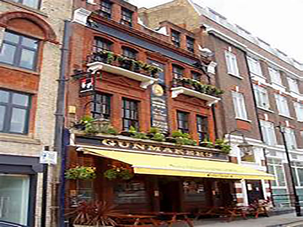 Seven police officers injured in London as pubs reopens in England