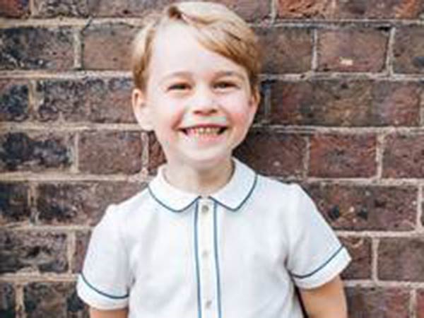 Prince George receives special gift from documentarian David Attenborough in new royal family photos