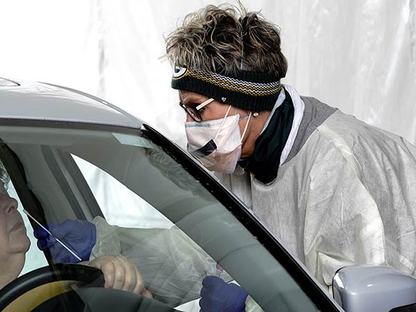 US reports record 83,000 coronavirus cases in one day