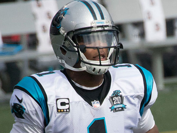 Cam Newton gets into kerfuffle with Dolphins players after Patriots win, explains opponents were reaching for chain