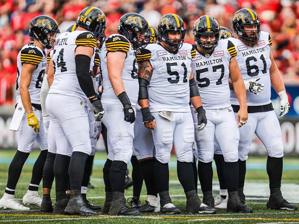 Ticats maul Redblacks for club-record 13th win