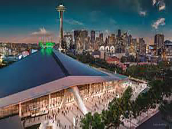 Jeff Bezos makes green pledge with new stadium - but critics say 'billionaires won't save us'