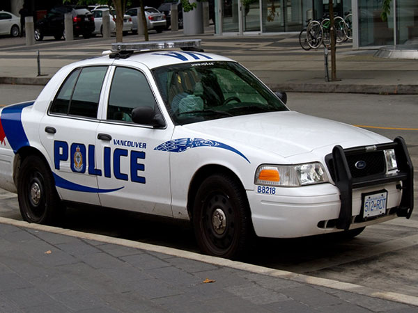 Woman dragged under van on Hastings Street walked between the vehicle and its cargo trailer, police say