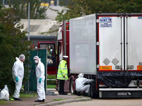 Driver in UK truck deaths charged with 39 manslaughter counts
