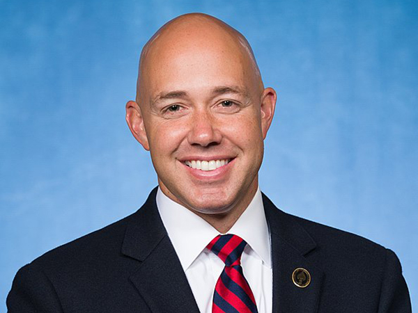 Rep. Mast waits silently after asking for names of any fallen Americans whose deaths didn't justify Soleimani strike
