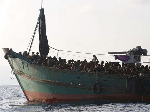 Italy's coastguard works to rescue 1,200 migrants drifting at sea