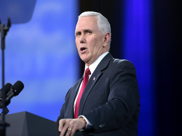 Pence urges people to wear masks as US cases surge