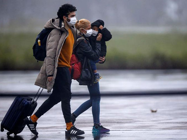 Brazil to quarantine visitors with virus symptoms