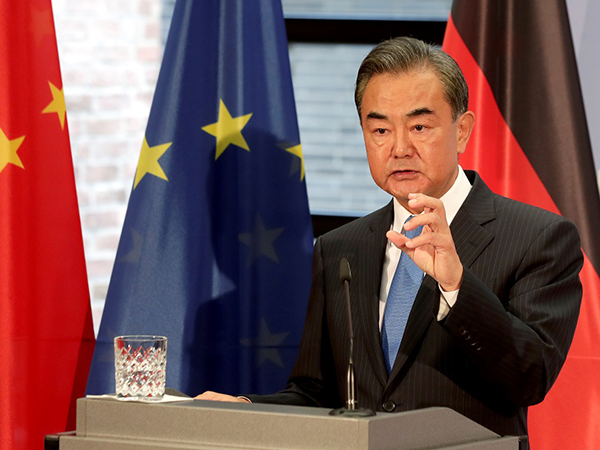 Chinese FM to visit Japan, may meet Suga