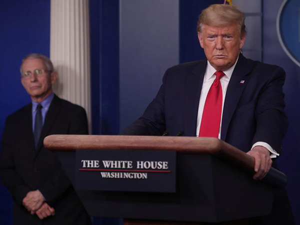 Trump extends federal social distancing guidelines to April 30