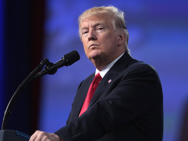 Trump publicly minimizes impeachment while he stews privately