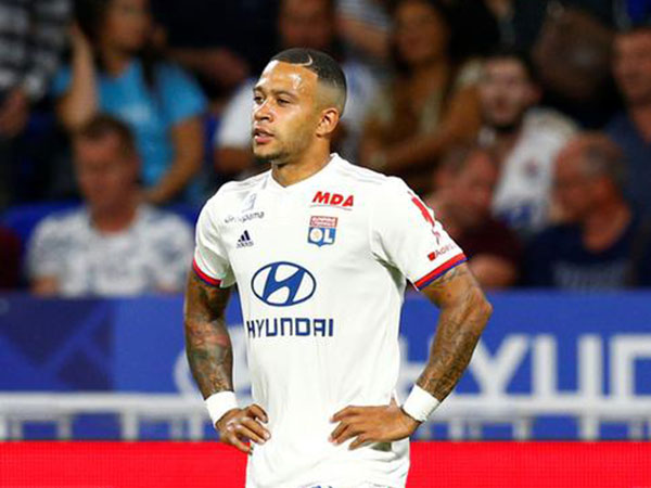 Depay, Dembele lead Lyon's six-goal rout of Angers in Ligue 1