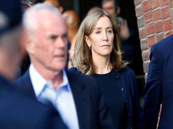 Felicity Huffman gets prison time for paying off SAT fixer in college admissions scheme