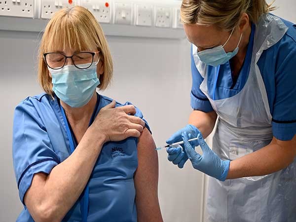 Over half of Canadians receive first dose of COVID-19 vaccine