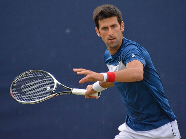 Djokovic survives Tsitsipas's fight-back, sets Nadal showdown at Roland Garros