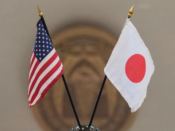 Japan, US extend trade talks by one day