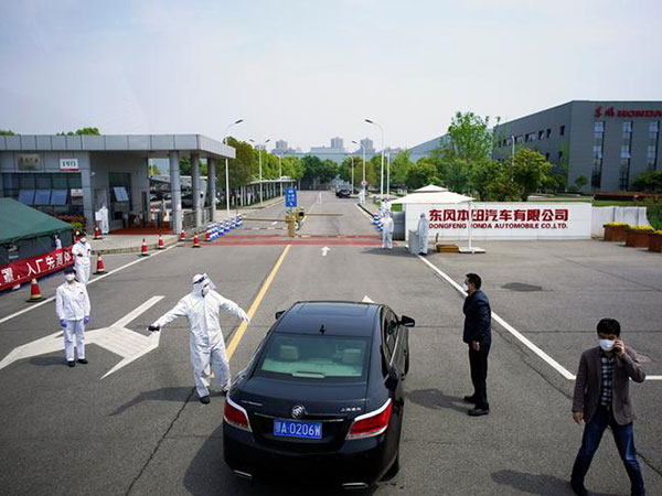 Wuhan lifts outbound travel restrictions, ending months-long lockdown