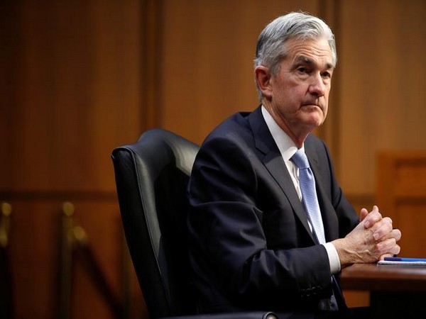 U.S. stocks end mixed as Wall Street awaits Powell's speech
